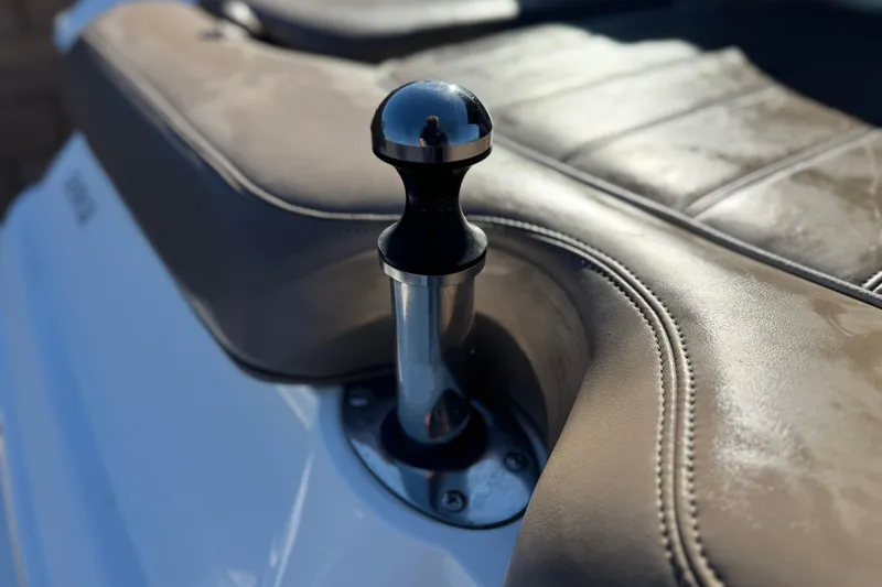 Slide: The Image of Close-up of a 2007 Cobalt 252 boat's leather seating and chrome detail. - 21