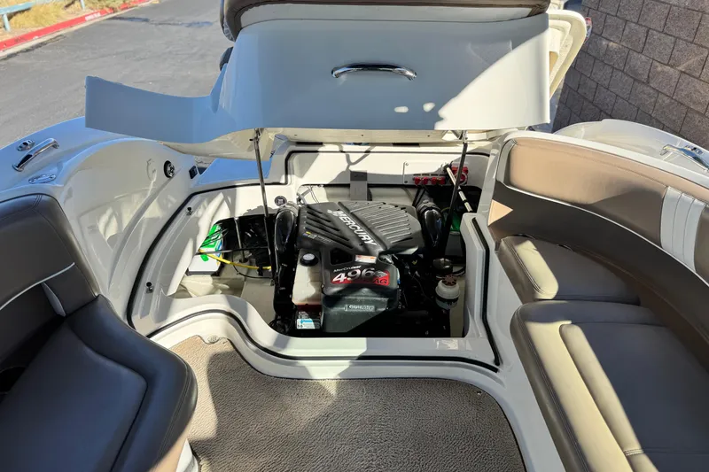 Slide: The Image of Open engine compartment of 2007 Cobalt 252 boat, showcasing Mercury 496 engine. - 26