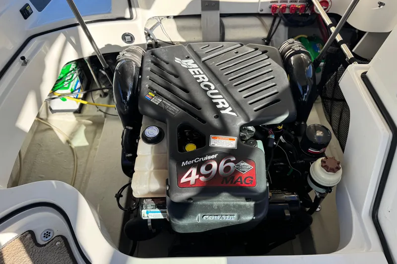 Slide: The Image of 2007 Cobalt 252 boat engine compartment featuring a Mercury MerCruiser 496 MAG engine. - 27