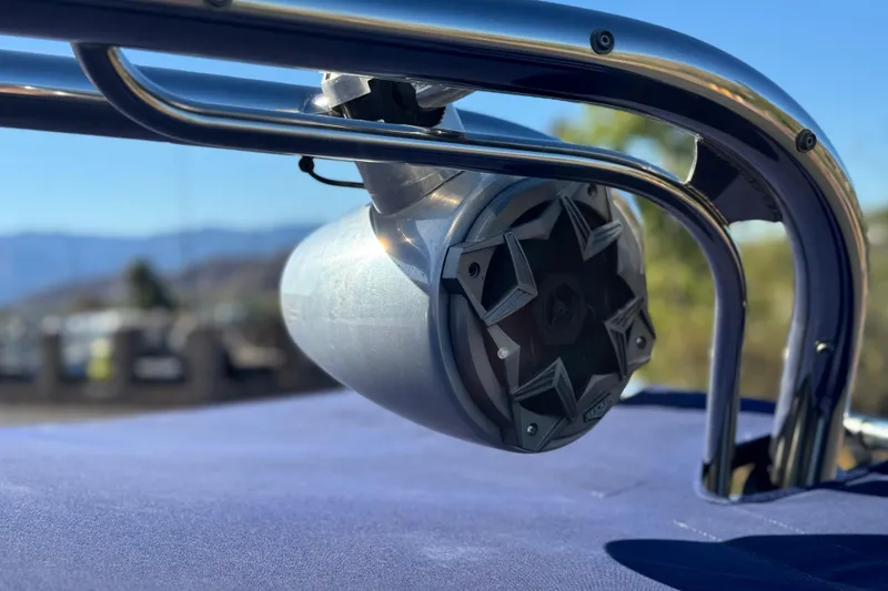 Slide: The Image of Close-up of a speaker mounted on a 2007 Cobalt 252 boat railing. - 30