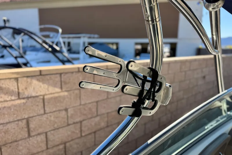 Slide: The Image of Stainless steel wakeboard rack on 2007 Cobalt 252 boat, mounted on a sunny day. - 31