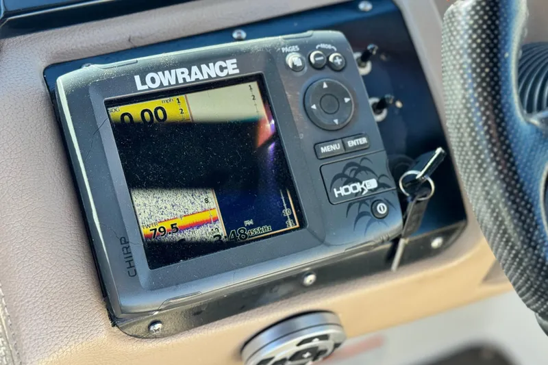 Slide: The Image of Lowrance Hook 5 fish finder on 2007 Cobalt 252 boat dashboard. - 38
