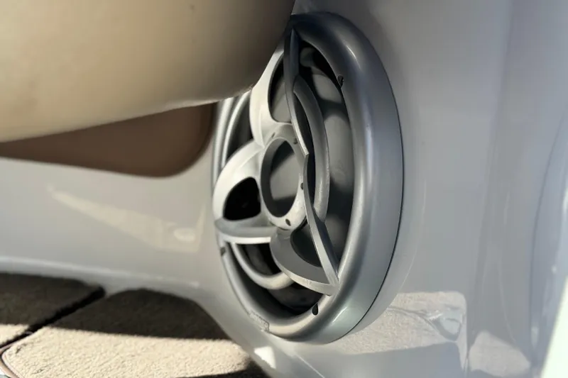 Slide: The Image of Speaker detail in 2007 Cobalt 252 boat interior, showcasing sleek design and craftsmanship. - 40