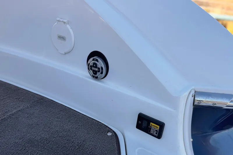 Slide: The Image of 2007 Cobalt 252 boat interior with control panel and speaker. - 8