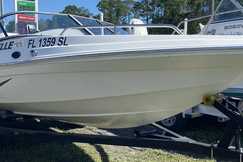 The Image of 2016 Caravelle 16 EBo boat on trailer, side view, with registration FL 1359 SL. - 1