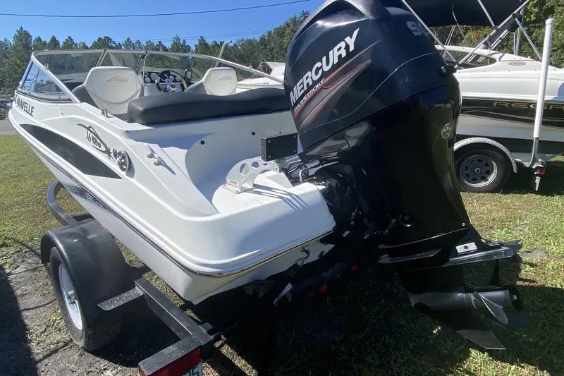 Slide: The Image of 2016 Caravelle 16 EBo boat with Mercury outboard motor on trailer. - 3