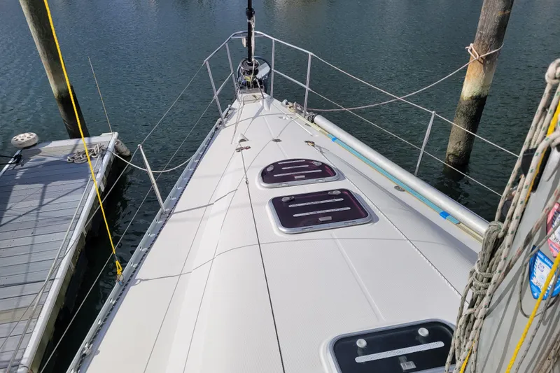 Slide: The Image of Deck of 1996 Beneteau First 42s7 sailboat with rigging and hatches. - 17