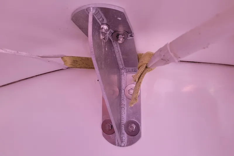 Slide: The Image of Anchor locker of a 1996 Beneteau First 42s7 sailboat with chain and winch. - 21