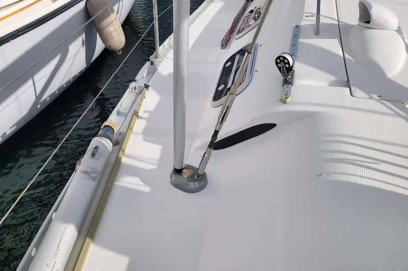 Slide: The Image of Metal bracket inside 1996 Beneteau First 42s7 sailboat, showcasing structural detail. - 25