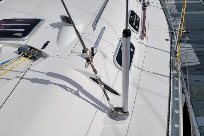Slide: The Image of 1996 Beneteau First 42s7 sailboat docked in marina, top deck view. - 26