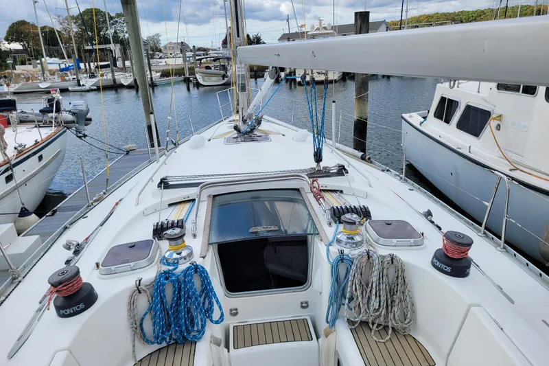 Slide: The Image of Deck of 1996 Beneteau First 42s7 sailboat with rigging and hatches. - 28