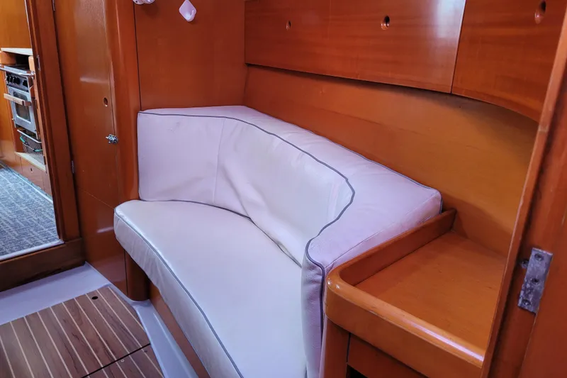 Slide: The Image of Interior view of 1996 Beneteau First 42s7 yacht bathroom with toilet and wooden accents. - 39