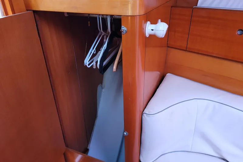 Slide: The Image of Coiled ropes on Beneteau First 42s7 yacht's wooden interior, 1996 model. - 40