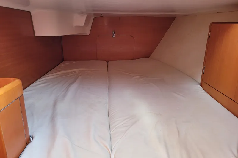 Slide: The Image of Control panel of a 1996 Beneteau First 42s7 yacht with various switches and gauges. - 48