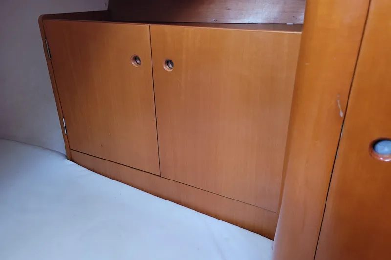 Slide: The Image of Interior cabin of 1996 Beneteau First 42s7 sailboat, featuring a cozy double berth. - 50