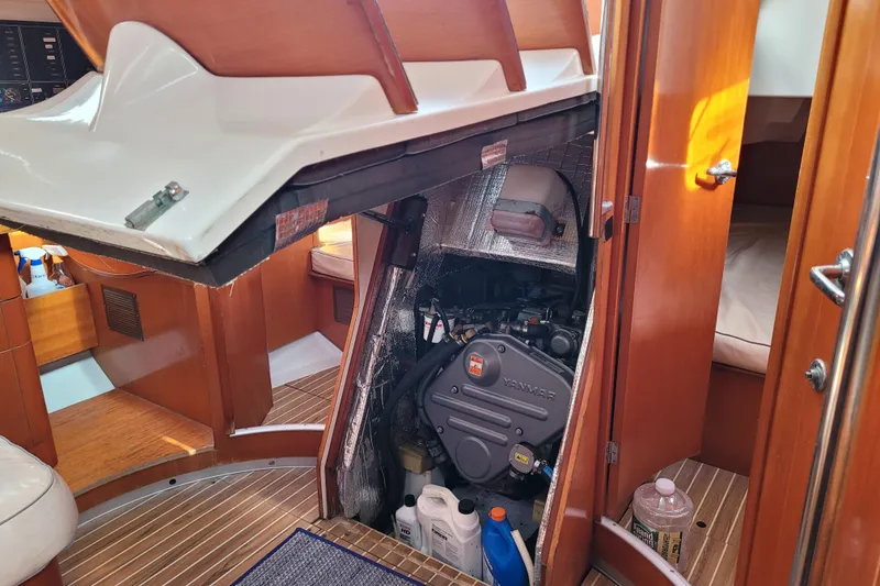 Slide: The Image of Interior cabin of 1996 Beneteau First 42s7 with solar panel on bed. - 54