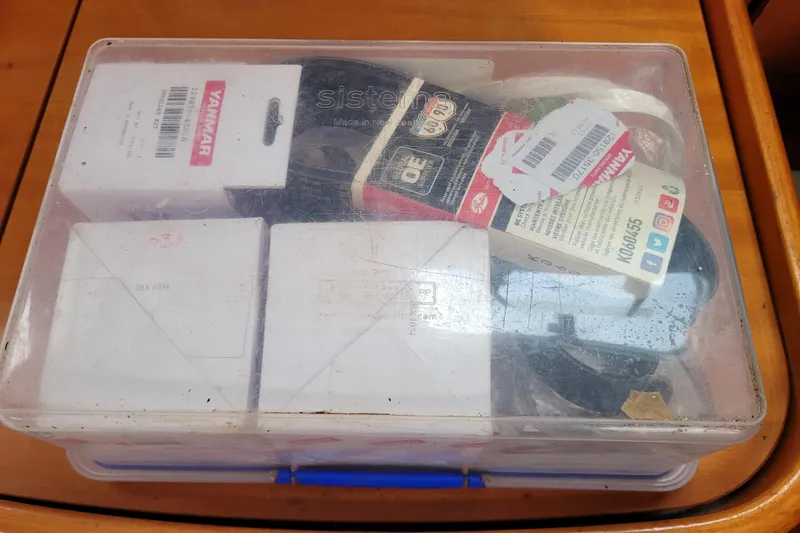 Slide: The Image of Battery compartment of a 1996 Beneteau First 42s7 sailboat, showing wiring and components. - 65