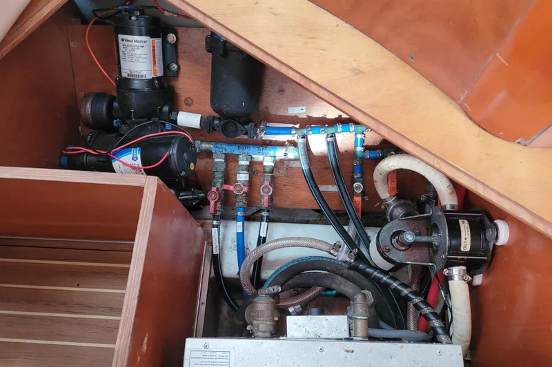 Slide: The Image of Interior view of 1996 Beneteau First 42s7 sailboat showing wooden cabinetry and appliances. - 68