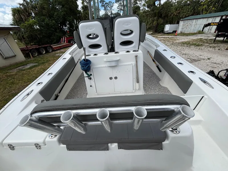 Slide: The Image of 2019 Cape Horn 24 OS boat interior with rod holders and seating. - 11