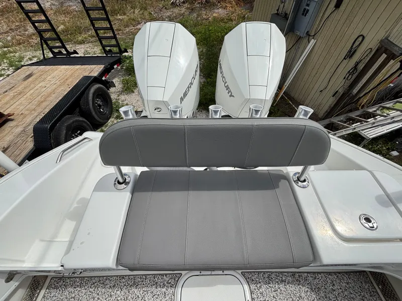 Slide: The Image of 2019 Cape Horn 24 OS boat with dual Mercury engines and gray seating. - 29