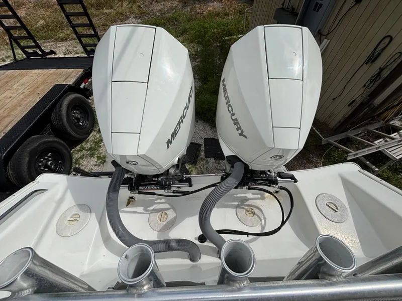 Slide: The Image of 2019 Cape Horn 24 OS boat with dual Mercury outboard engines, viewed from above. - 30