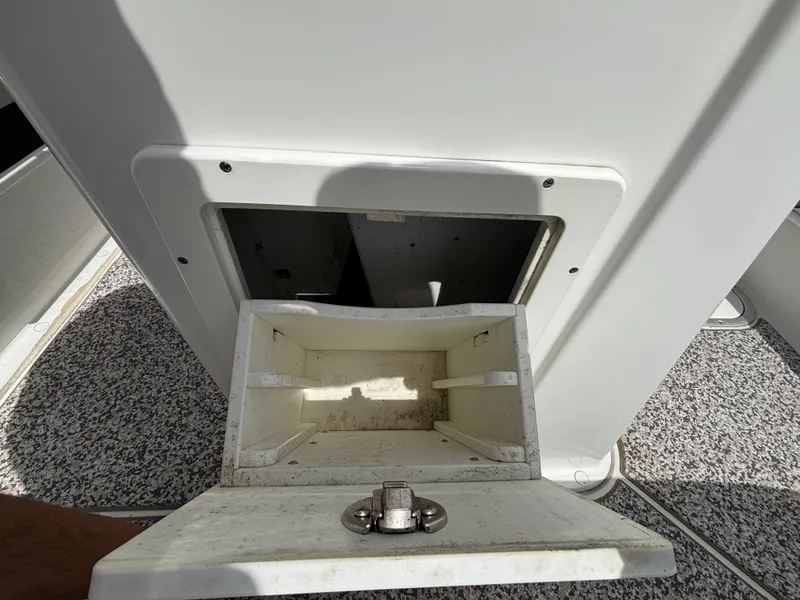 Slide: The Image of Open storage compartment on a 2019 Cape Horn 24 OS boat. - 31