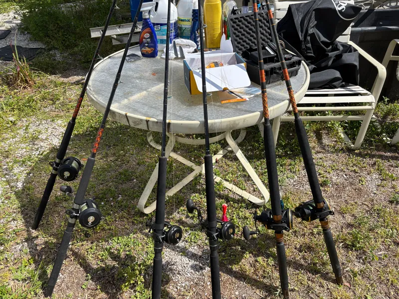 Slide: The Image of Fishing rods and gear on outdoor table, Cape Horn 24 OS, 2019 model. - 37