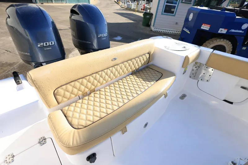 Slide: The Image of 2021 Sportsman Heritage 251 Center Console with dual Yamaha 200 engines and tan quilted seating. - 16