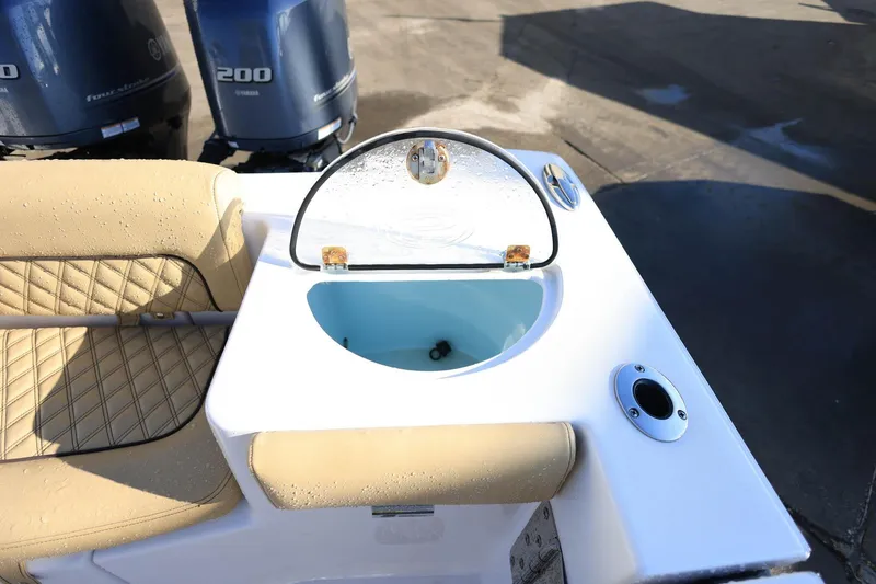 Slide: The Image of 2021 Sportsman Heritage 251 Center Console with livewell and Yamaha engines. - 17