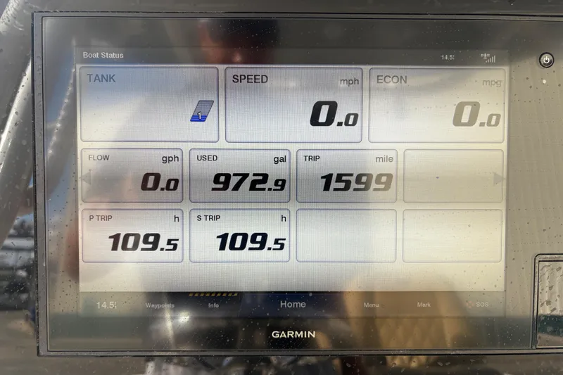 Slide: The Image of Display screen of 2021 Sportsman Heritage 251 Center Console showing boat status metrics. - 21