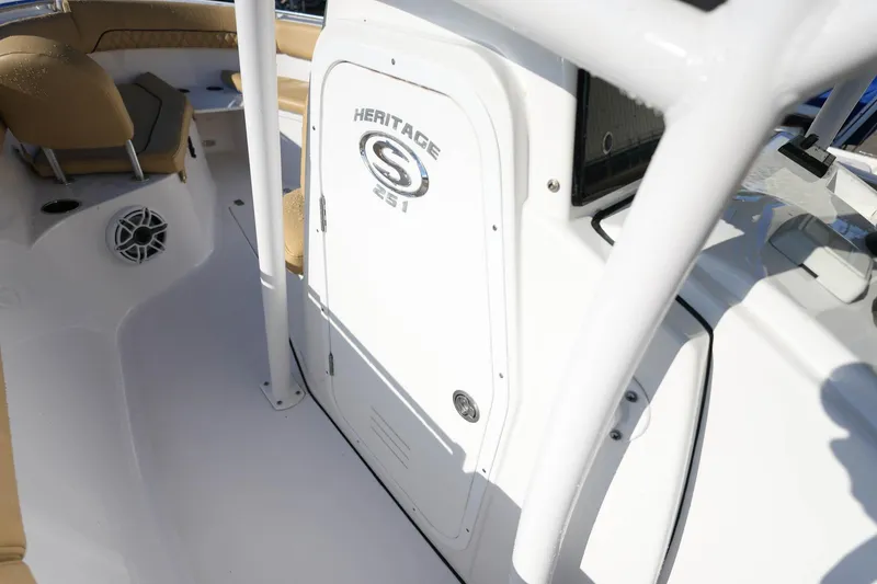 Slide: The Image of 2021 Sportsman Heritage 251 Center Console interior with seating and storage. - 22