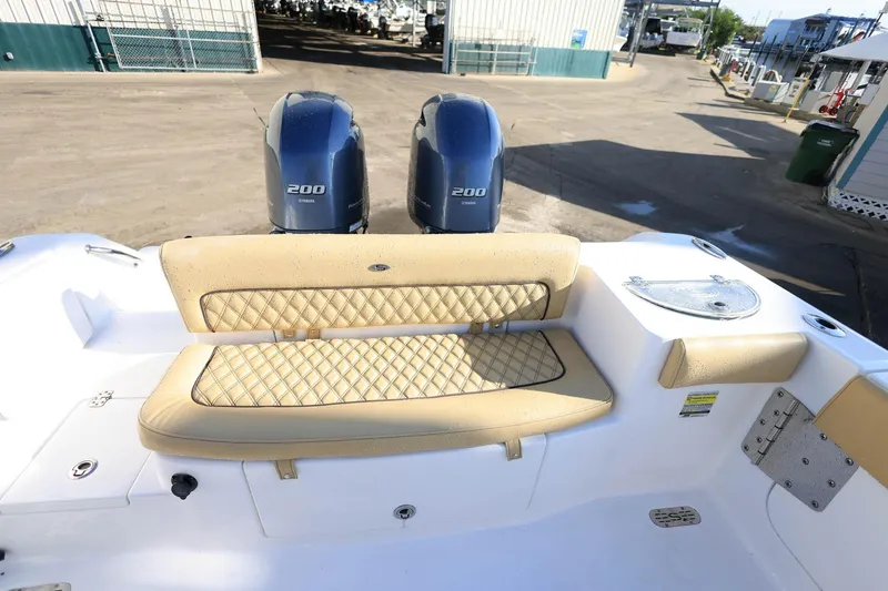Slide: The Image of 2021 Sportsman Heritage 251 Center Console with dual Yamaha 200 engines and cushioned seating. - 32