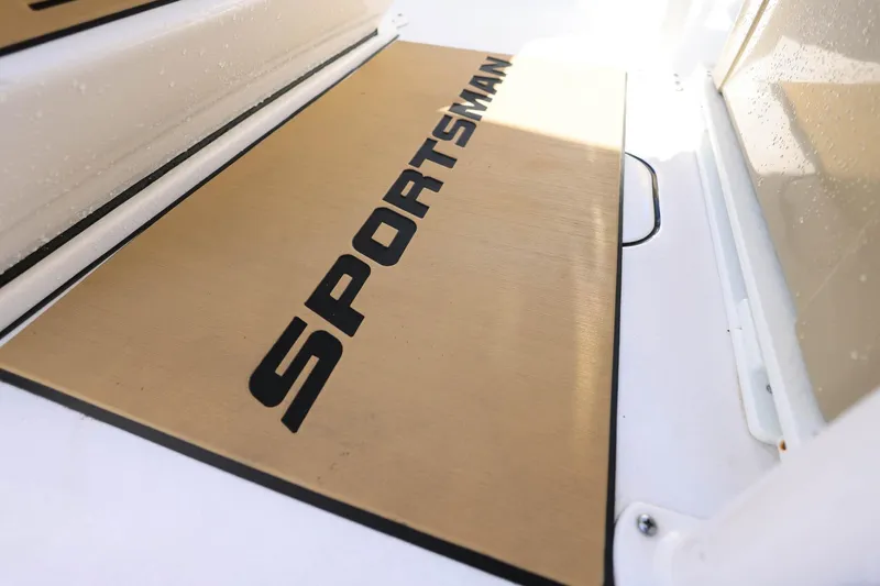 Slide: The Image of 2021 Sportsman Heritage 251 Center Console boat deck with logo detail. - 36