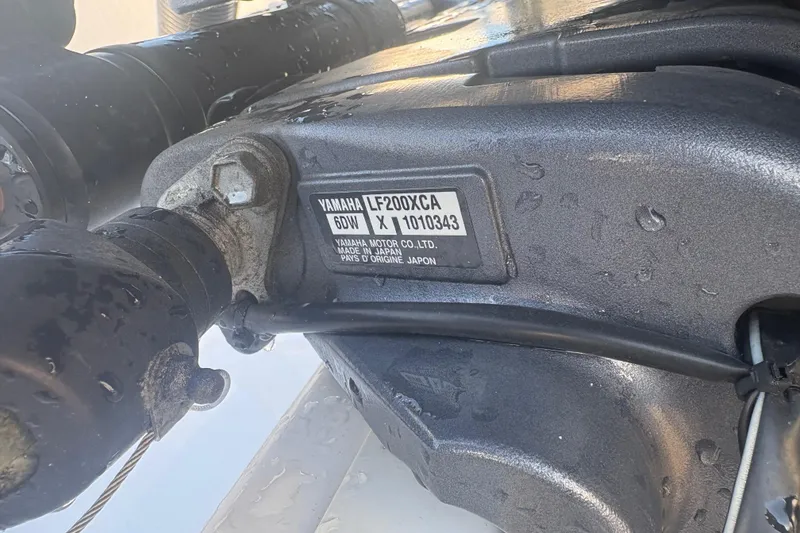 Slide: The Image of Close-up of Yamaha LF200XCA engine on 2021 Sportsman Heritage 251 Center Console. - 38
