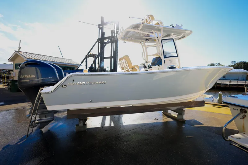 Slide: The Image of 2021 Sportsman Heritage 251 Center Console boat on display with Yamaha engine. - 7