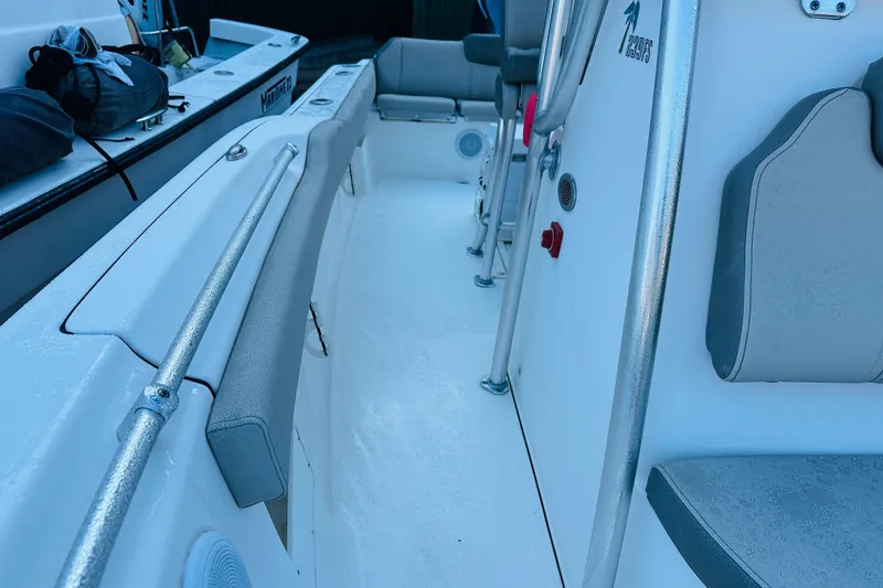 Slide: The Image of 2022 Key West 239 FS boat interior with seating and equipment. - 18
