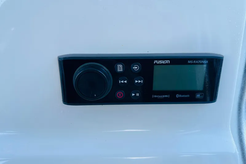 Slide: The Image of Fusion MS-RA70NSX marine stereo on 2022 Key West 239 FS boat dashboard. - 27