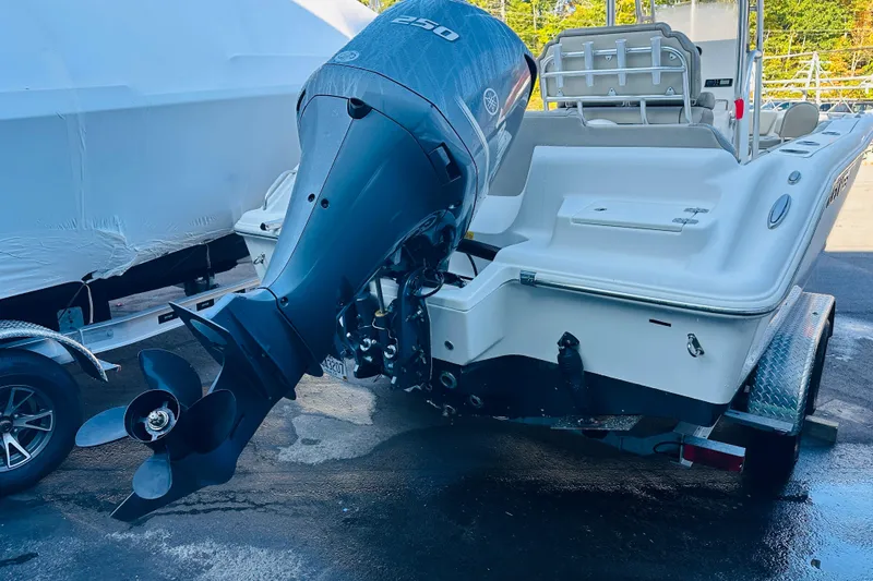 Slide: The Image of 2022 Key West 239 FS boat with Yamaha outboard motor on trailer. - 4