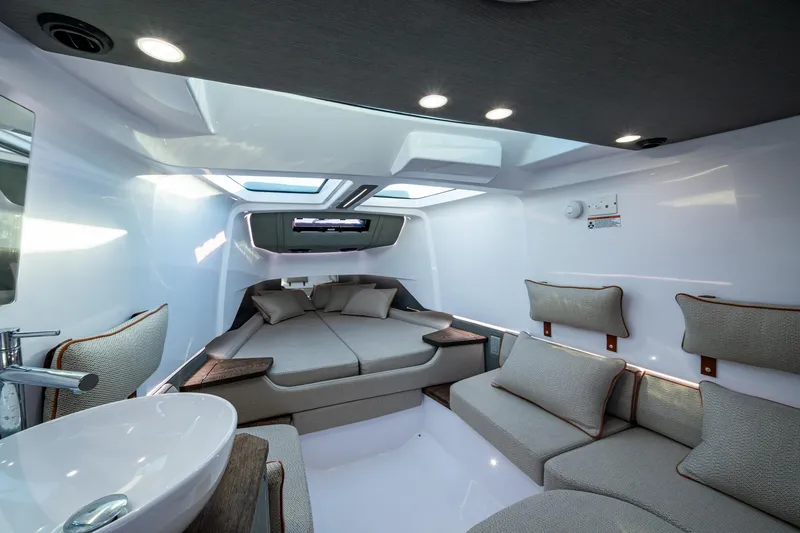 Slide: The Image of Luxurious interior of 2021 Axopar 37 boat with modern seating and skylights. - 6