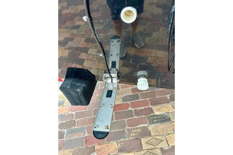 Slide: The Image of 2023 Starcraft SVX 171 OB boat detail showing hull and fittings on brick surface. - 15