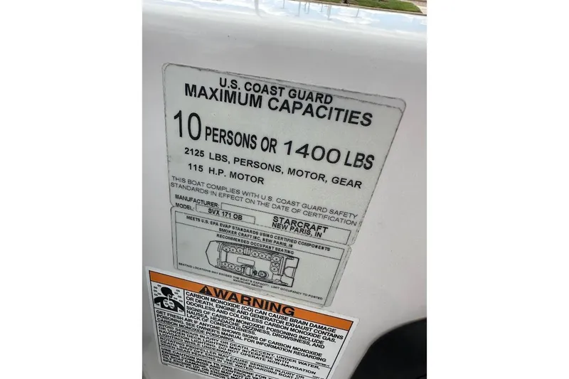 Slide: The Image of 2023 Starcraft SVX 171 OB capacity label, 10 persons or 1400 lbs, 115 HP motor. - 33