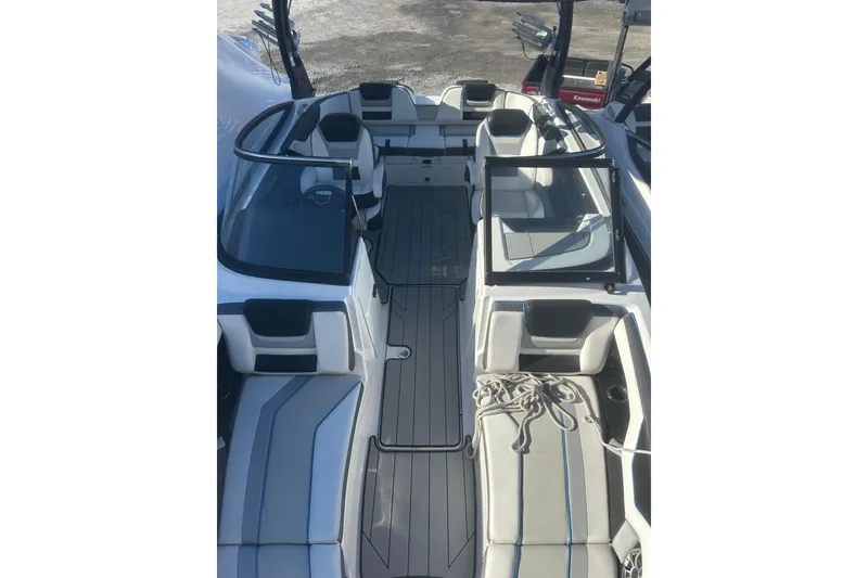 Slide: The Image of Engine compartment of 2021 Yamaha Boats 212XE, featuring high output components. - 21