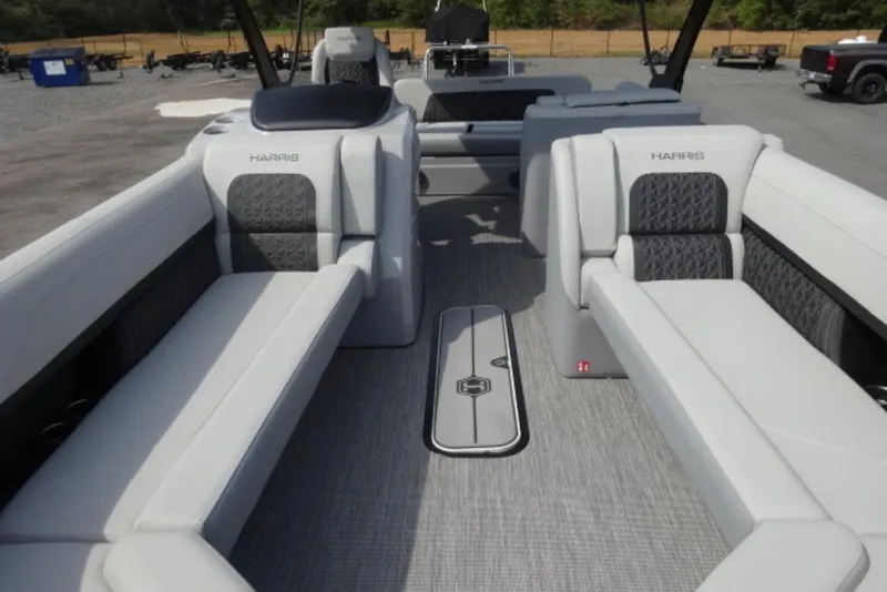 Slide: The Image of 2026 Harris Solstice 250 pontoon boat interior with luxurious seating and modern design. - 11