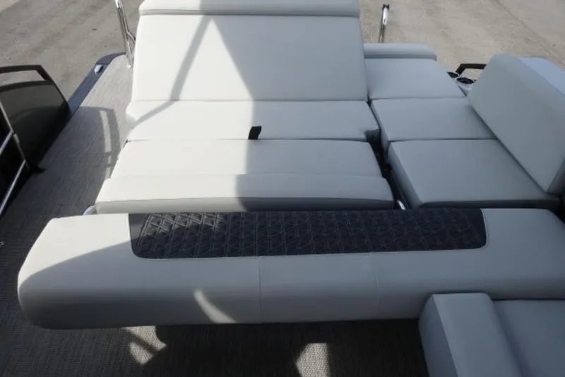 Slide: The Image of 2026 Harris Solstice 250 boat interior with luxurious seating and modern design. - 14