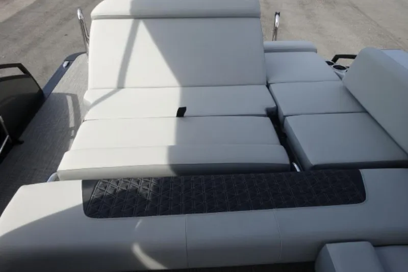 Slide: The Image of Luxurious seating on 2026 Harris Solstice 250 pontoon boat, featuring modern design and comfort. - 17