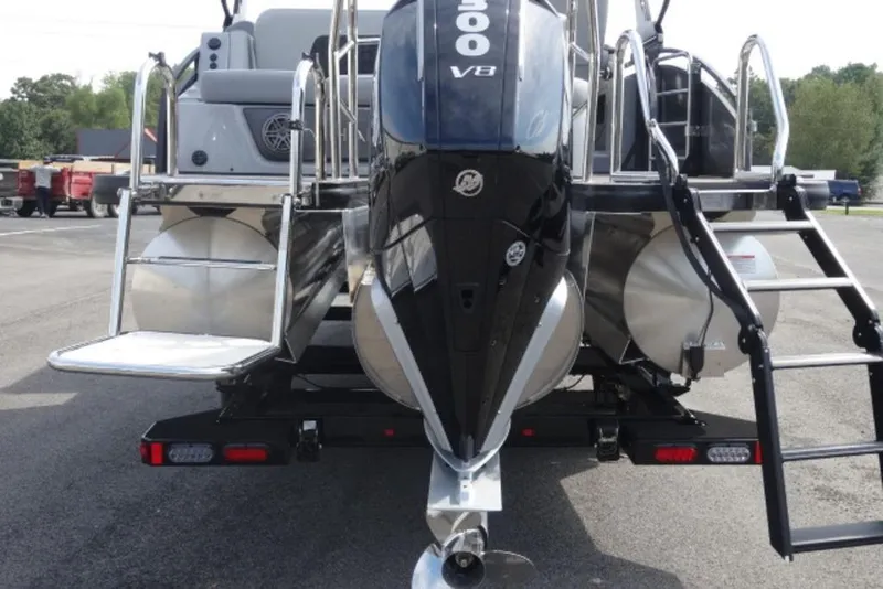 Slide: The Image of 2026 Harris Solstice 250 pontoon boat with powerful V8 engine, rear view. - 3