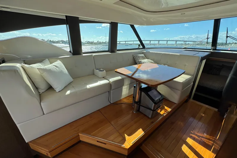 Slide: The Image of Luxurious interior of 2016 Tiara Yachts C44 Coupe with elegant seating and wooden flooring. - 35