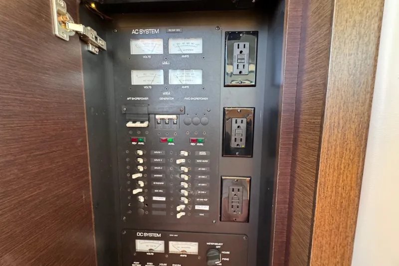 Slide: The Image of Electrical panel of 2016 Tiara Yachts C44 Coupe with AC and DC systems. - 65