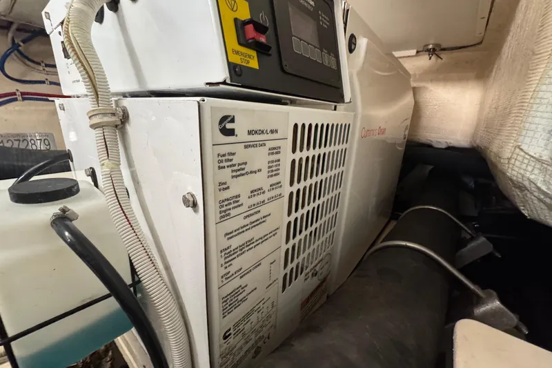Slide: The Image of Engine room of 2016 Tiara Yachts C44 Coupe with Cummins generator. - 76