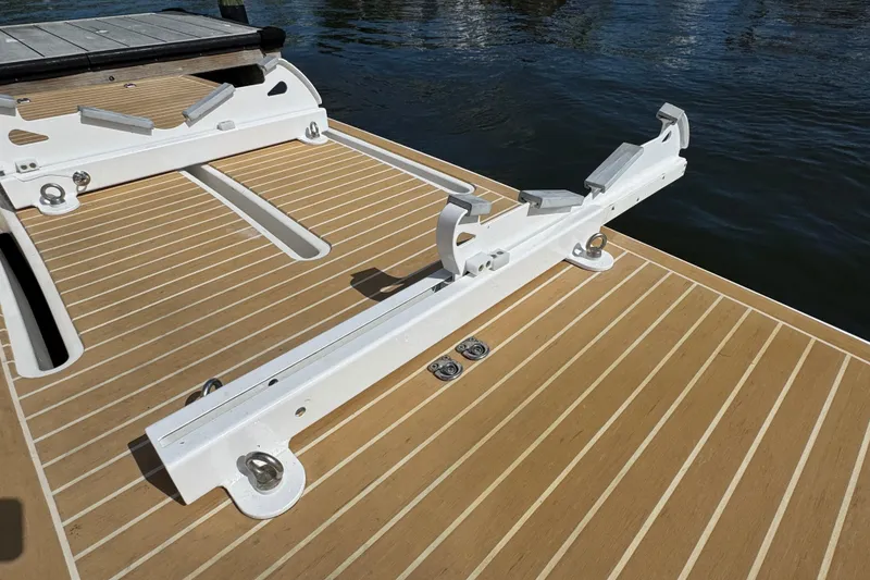 Slide: The Image of 2016 Tiara Yachts C44 Coupe swim platform with white mounting brackets. - 92